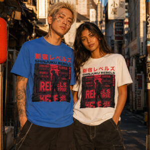 Couple wearing matching Shinjuku Rebels punk graphic tees in royal blue and white, standing in a narrow neon-sign alley